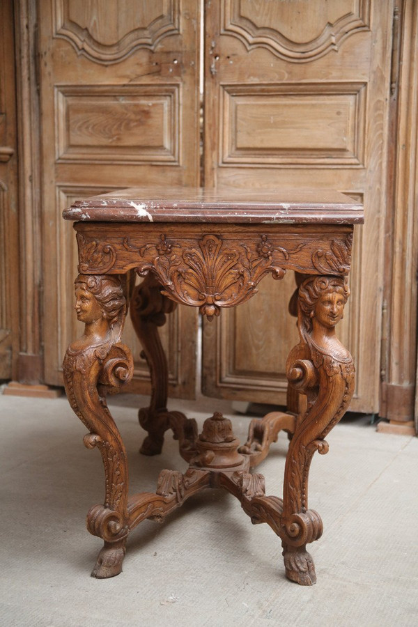 Table console en chêne sculptée d'époque Régence vers 1725.