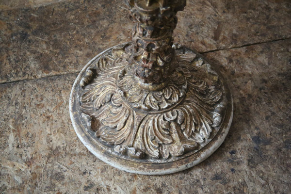 Carved, gilded and painted wood candleholder, Spanish work, 17th century