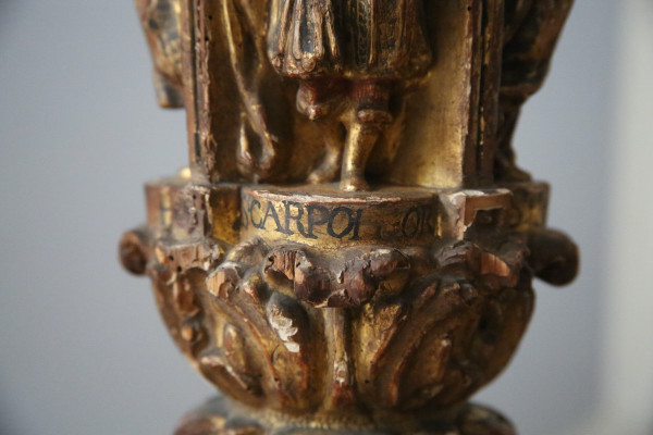 Carved, gilded and painted wood candleholder, Spanish work, 17th century