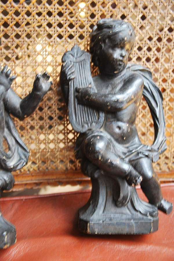 Coppia di putti musicanti in legno del XVIII secolo