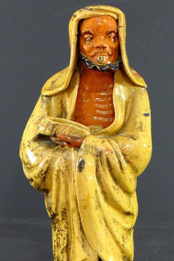 China, Early 20th Century, Glazed Earthenware Arhat Statue.