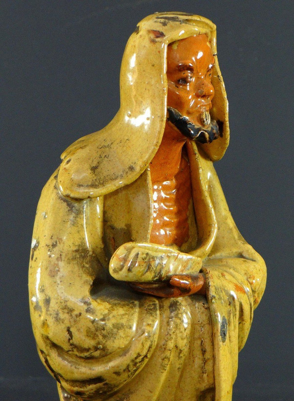 China, Early 20th Century, Glazed Earthenware Arhat Statue.