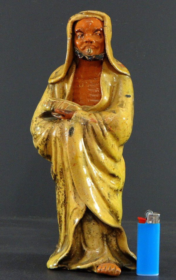 China, Early 20th Century, Glazed Earthenware Arhat Statue.