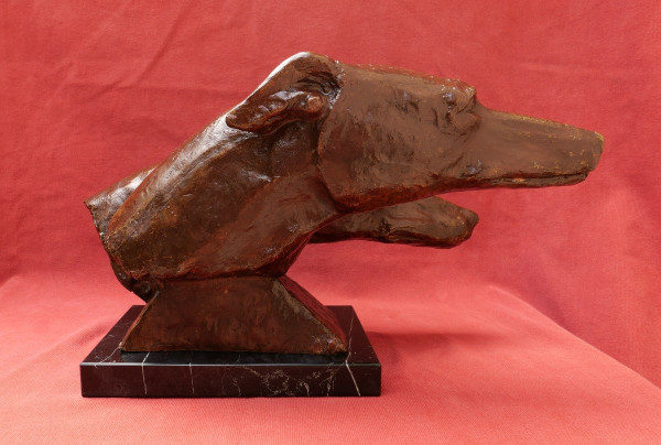 M. BERTIN, Two greyhound heads