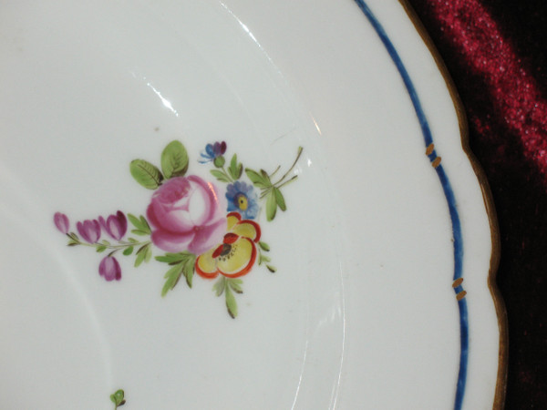 Locré porcelain plate with floral decoration, 18th century