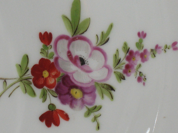 Locré porcelain plate with floral decoration, 18th century