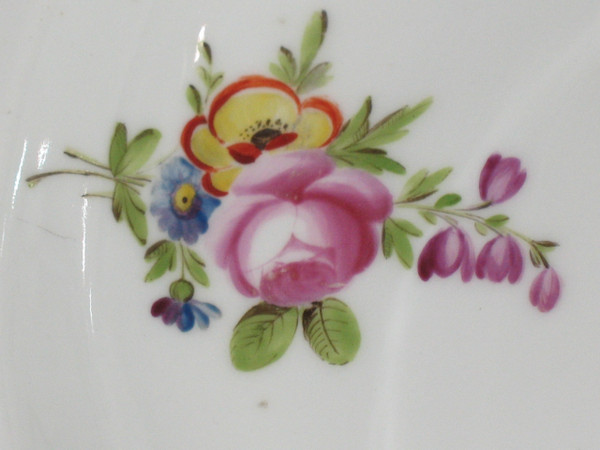 Locré porcelain plate with floral decoration, 18th century