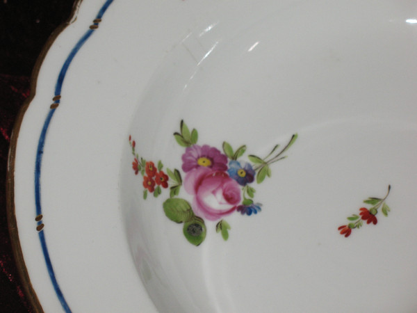 Locré porcelain plate with floral decoration, 18th century