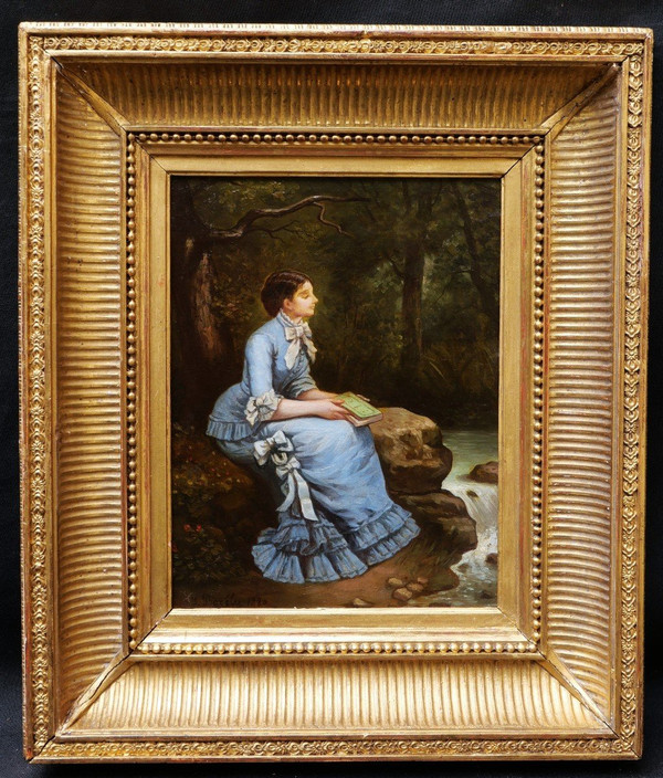 J. BORÉLY, Woman sitting in the forest, a book in her hand