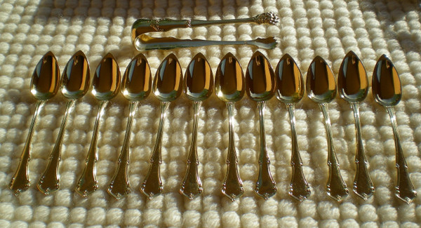 Box of 12 spoons and matching sugar tongs in vermeil Goldsmith T. Berthier late 19th century