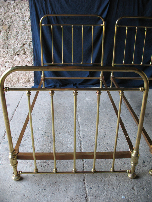 Pair of romantic style brass twin beds, early 20th century