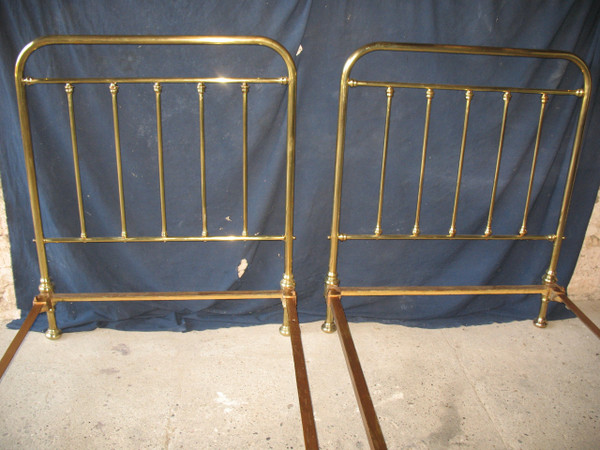 Pair of romantic style brass twin beds, early 20th century