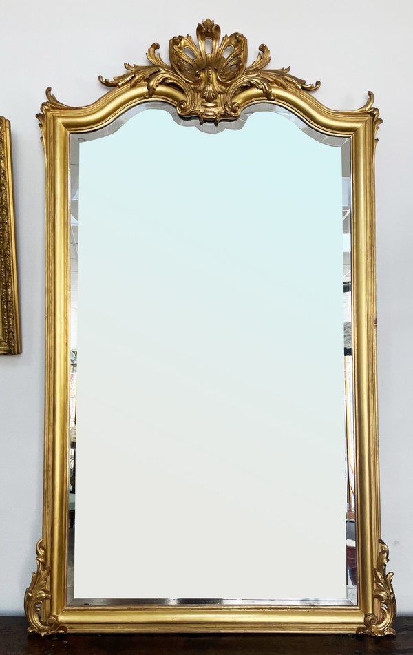 Large gilded mirror from the 19th century in LOUIS XV style