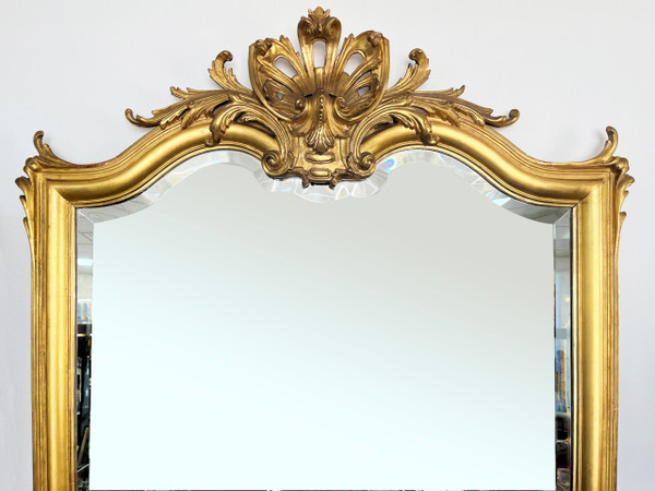 Large gilded mirror from the 19th century in LOUIS XV style