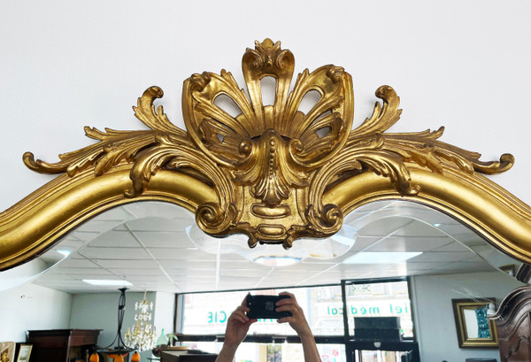 Large gilded mirror from the 19th century in LOUIS XV style