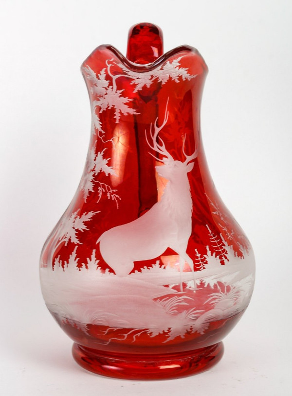 A late 19th century bohemian crystal pitcher