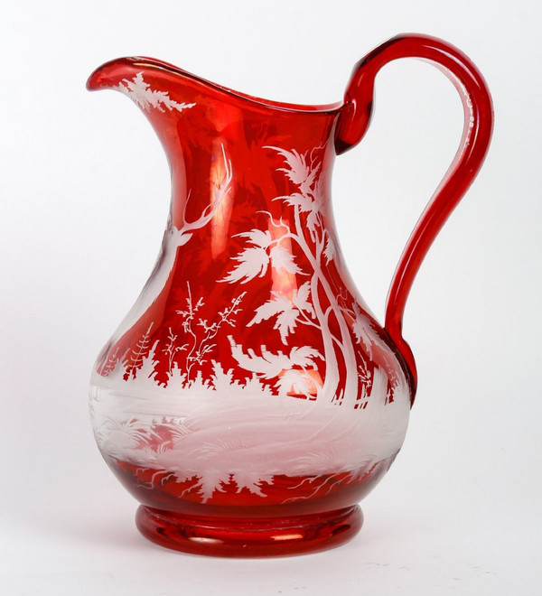 A late 19th century bohemian crystal pitcher