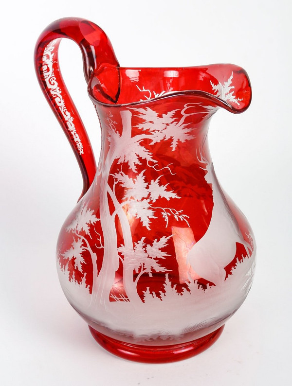 A late 19th century bohemian crystal pitcher