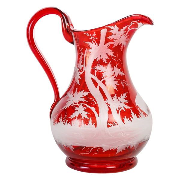 A late 19th century bohemian crystal pitcher