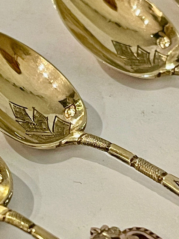 Series Of Twelve Mocha Spoons In Silver And Vermeil