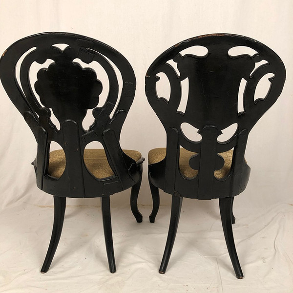 Fake pair of Napoleon III chairs, blackened wood and burgundy boiled cardboard