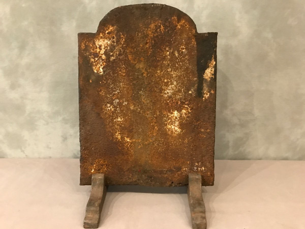 Small antique cast iron fireback from the 18th century