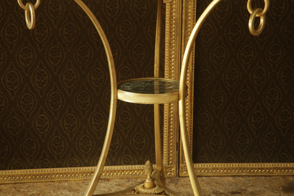 Tripod pedestal table in chased and gilded bronze, 20th century neoclassical work.