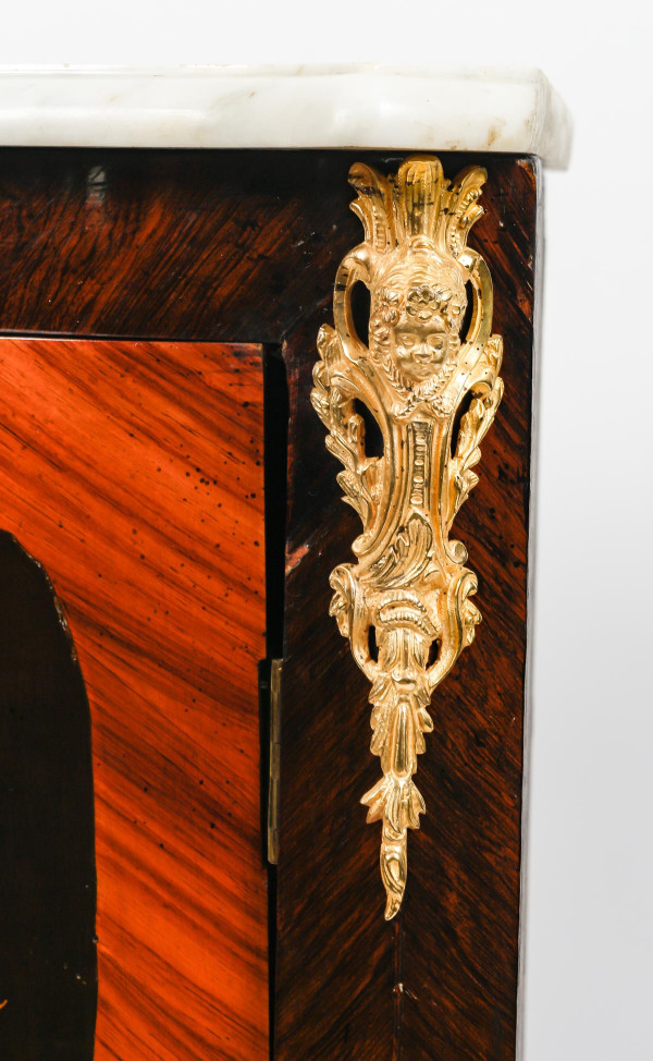 a pair of late 19th century marquetry corner cabinets