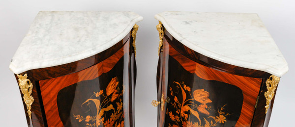 a pair of late 19th century marquetry corner cabinets