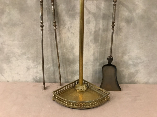 Beautiful old fireplace set in bronze and iron from the 19th century in Louis XVI style