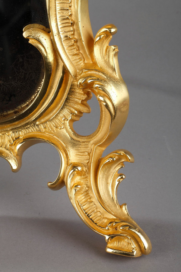 Miroir à poser en bronze doré de style Louis XV