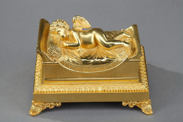 Bronze inkwell of a sleeping putto