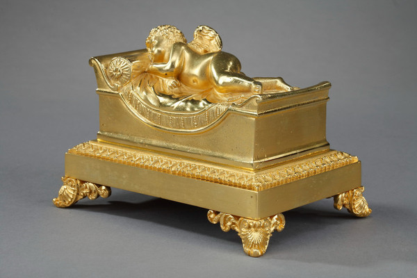 Bronze inkwell of a sleeping putto