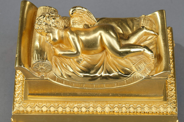 Bronze inkwell of a sleeping putto