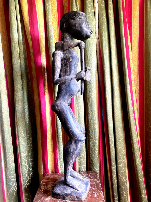 19th century Baule field man statue in carved wood