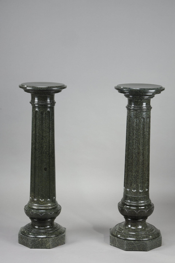 TWO LARGE FLUTED GREEN MARBLE COLUMNS