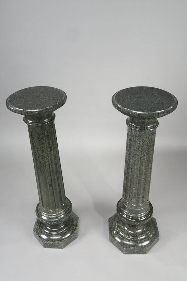 TWO LARGE FLUTED GREEN MARBLE COLUMNS