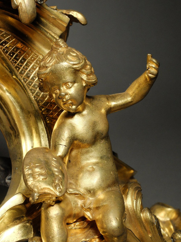 Pair of allegorical andirons from the Louis XV period