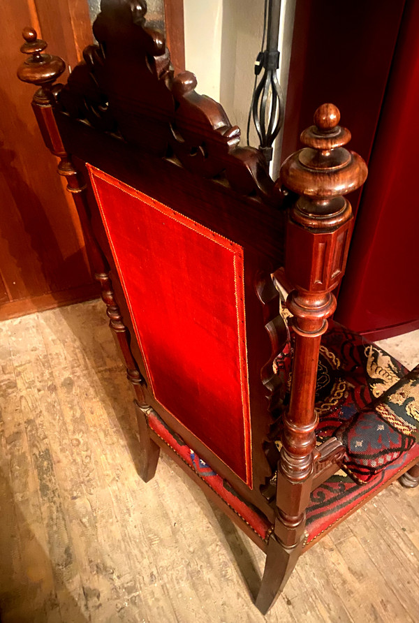 Important Napoleon III Renaissance-style armchair in rosewood upholstered with petit point tapestry.