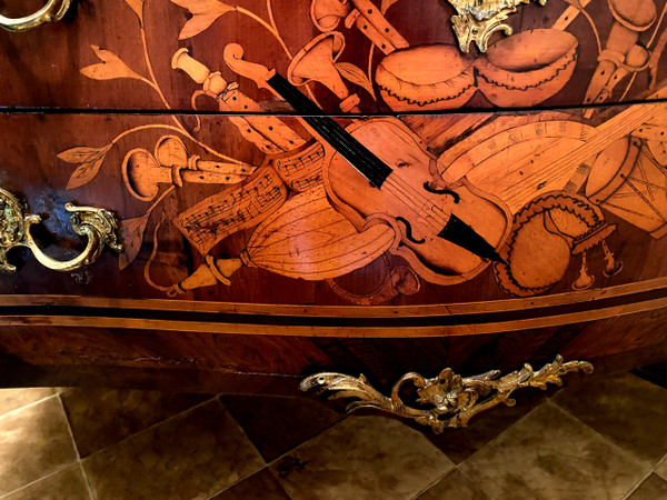 Superb rare and elegant two-drawer chest of drawers with rich marquetry of Louis XV musical instruments