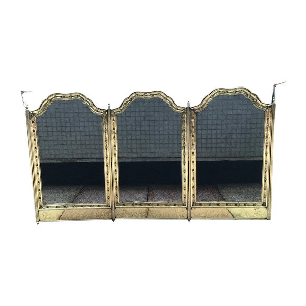 Large old fireplace fire screen in worked brass from the 19th century