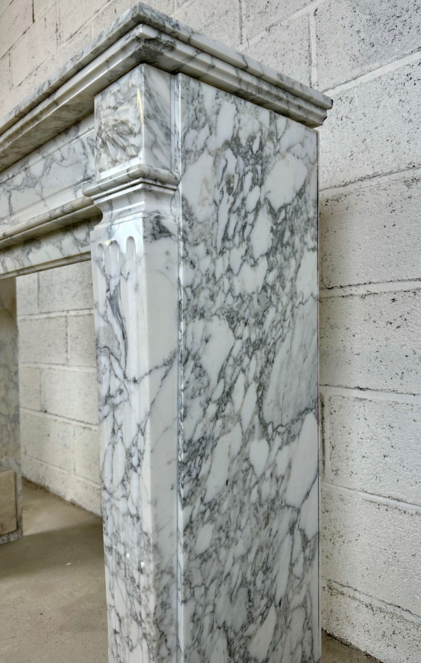 White marble mantel in the Louis XVI style