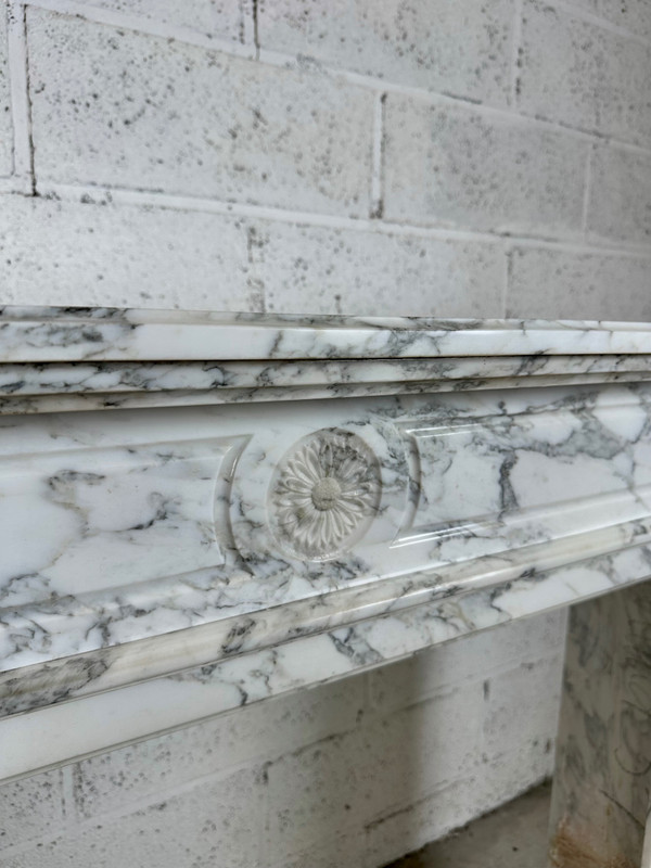 White marble mantel in the Louis XVI style