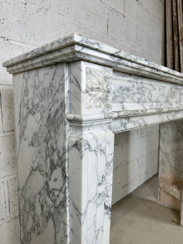 White marble mantel in the Louis XVI style