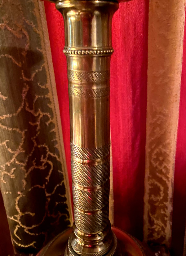 Very beautiful pair of First Empire period candlesticks in guilloché polished bronze called columnar