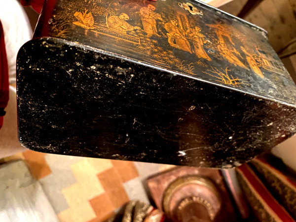 Black boiled cardboard tea box finely decorated with animated scenes in gold with two zinc compartments from the Napoleon III period