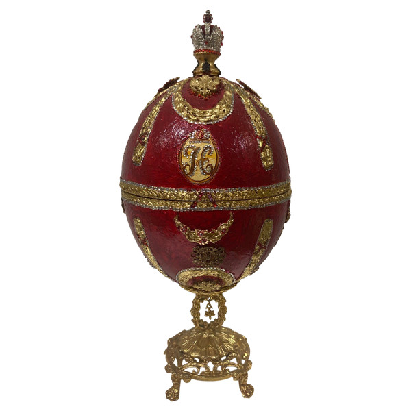 Egg-shaped jewelry box in boiled cardboard decorated with garlands, figures, double-headed eagles