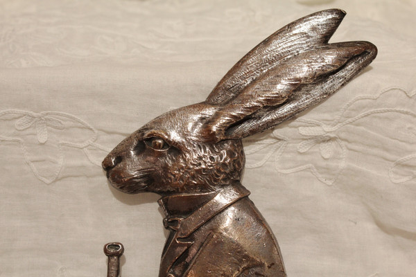 Silvered bronze plaque 'Rabbit with bugle' signed M. Podiebrad circa 1920-1930