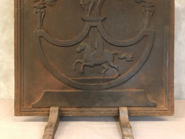 Antique cast iron fireback from the 19th century