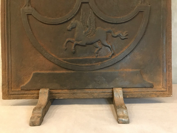 Antique cast iron fireback from the 19th century